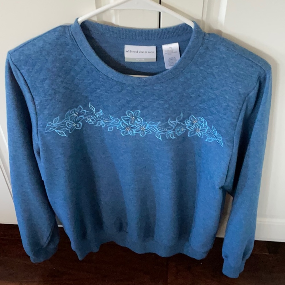 Pretty Blue Fleece lined top with floral accent